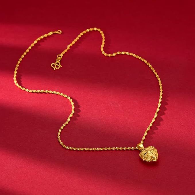 Gold heart pendant necklace on a fine chain for women daily wear