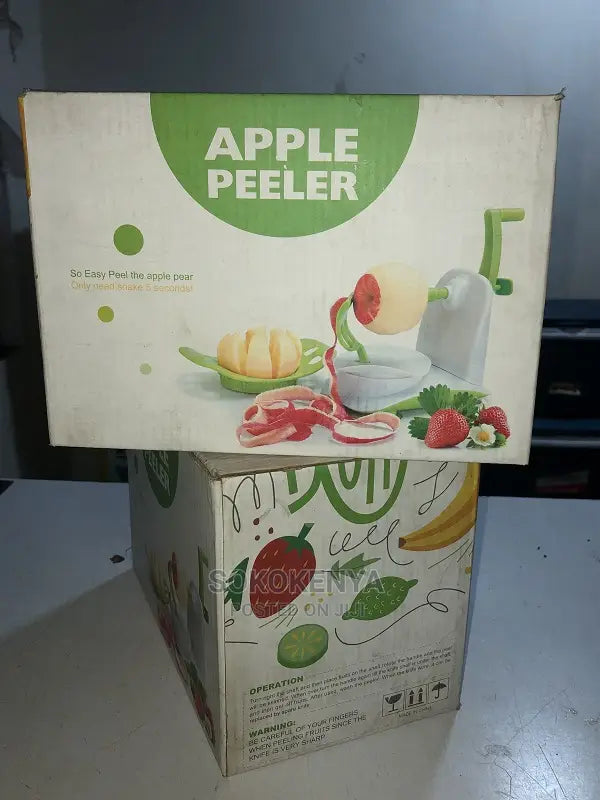Zambeel handheld fruit peeler displayed on neutral background for peeling fresh produce