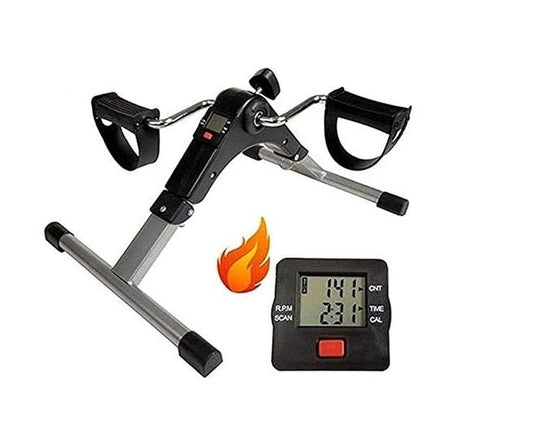 Mini portable exercise bike with adjustable resistance pedals for seated indoor leg and arm workouts
