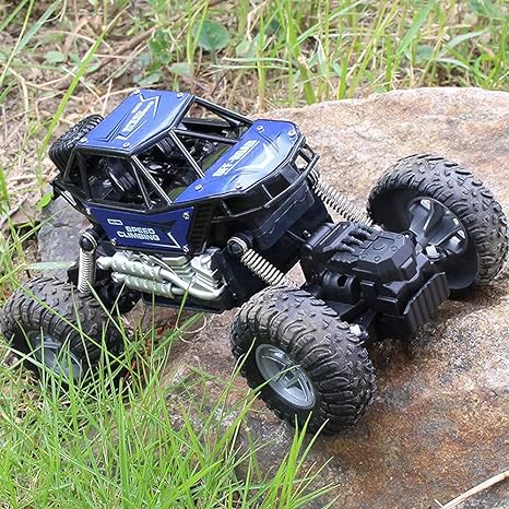 Remote control stunt car with rugged wheels and handheld transmitter for outdoor play