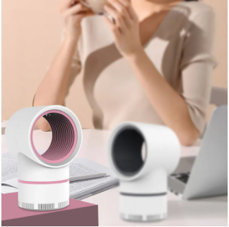 Compact mini mosquito killer device displayed on a desk for indoor pest control