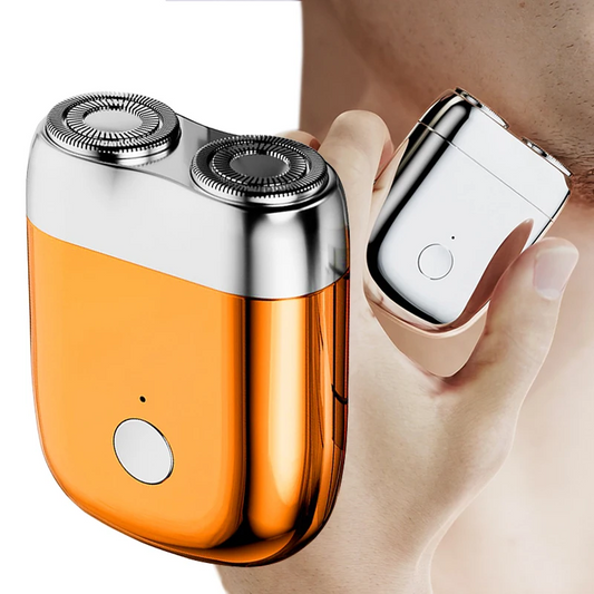 Silver BRELZA mini dual head electric razor for men showing compact portable size and shaving heads.