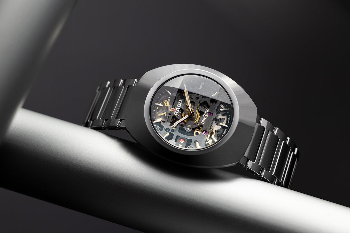 Rado DiaStar automatic watch featuring an exposed skeleton dial and multi color case design.
