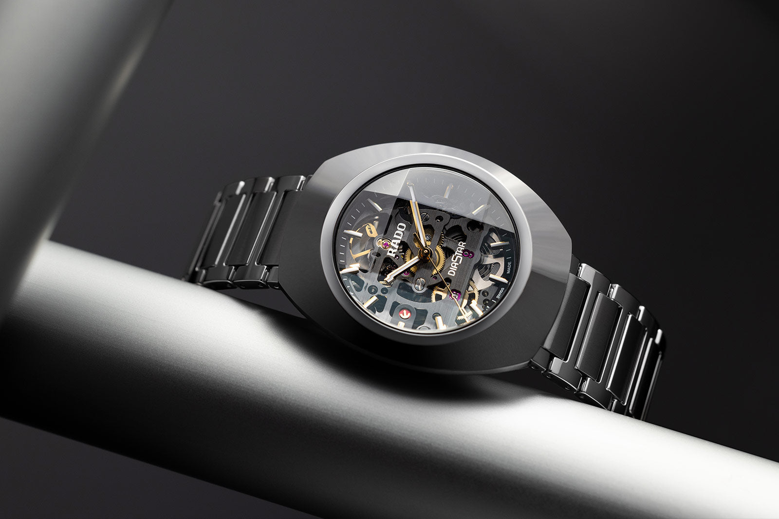 Rado DiaStar automatic watch featuring an exposed skeleton dial and multi color case design.