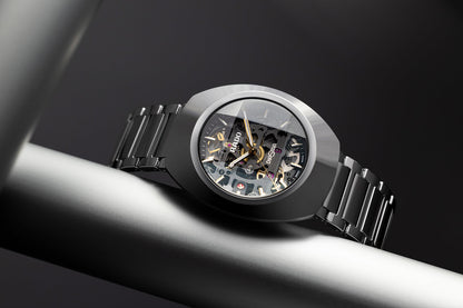 Rado DiaStar automatic watch featuring an exposed skeleton dial and multi color case design.