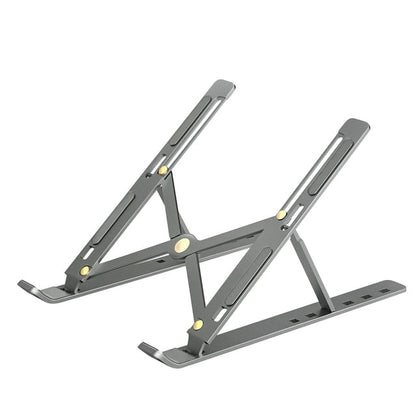 Adjustable laptop stand elevating a notebook for ergonomic desk workspace setup