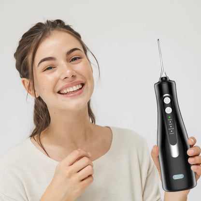 Black replacement filter tip for PUURSMILE water flosser designed for daily oral hygiene use.