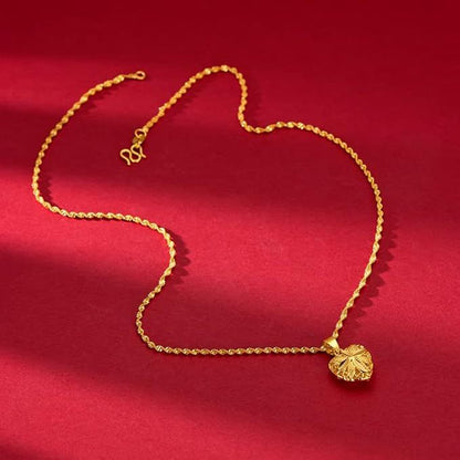 Gold heart pendant necklace on a fine chain for women daily wear