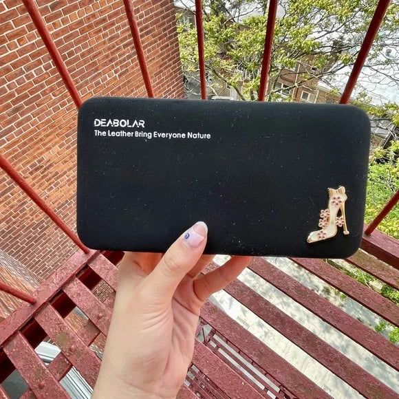 Women multifunctional wallet showing organized interior compartments and secure closure for daily essentials