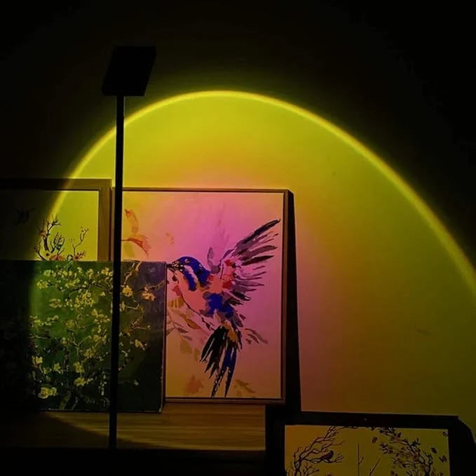LED sunset projector casting warm circular light on a wall for indoor home decor ambiance