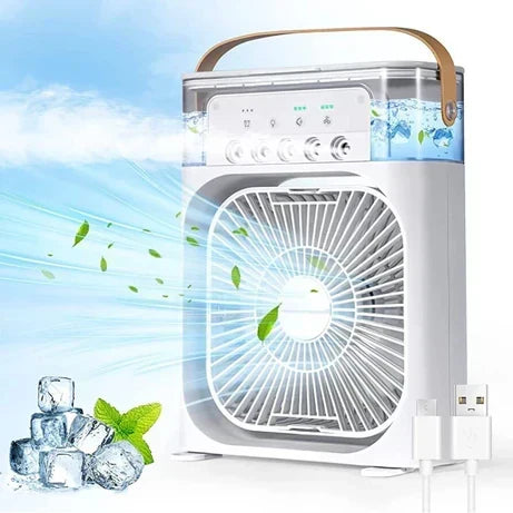 Portable mini USB cooling fan with water mist spray on a desk