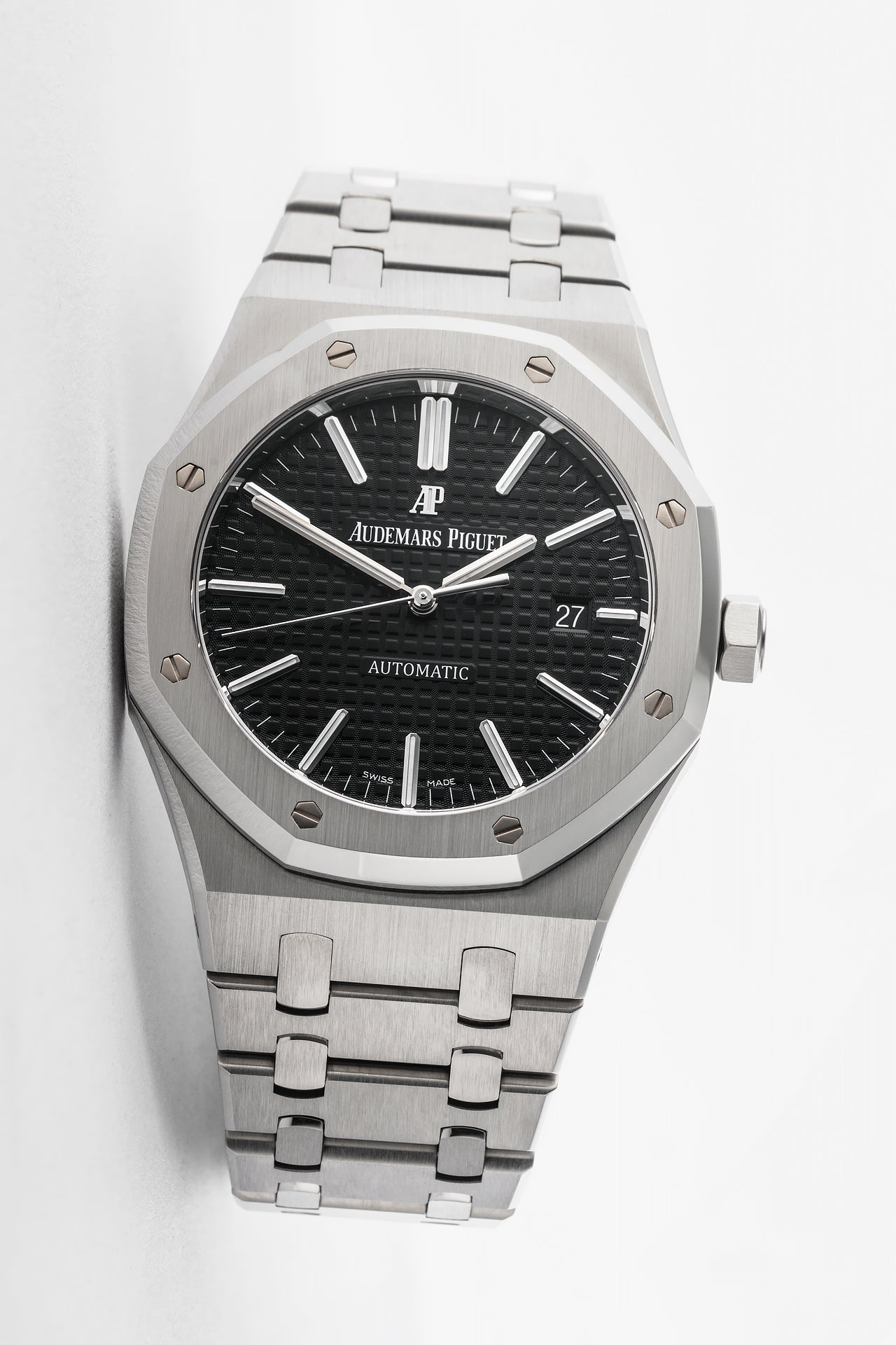 Stainless steel Audemars Piguet Royal Oak selfwinding watch with octagonal bezel and integrated bracelet.